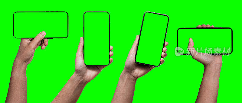 商人手里拿着黑色的智能手机，一款外形时髦的智能手机，设计得边缘很薄。绿幕背景-剪切路径。iPhone 14